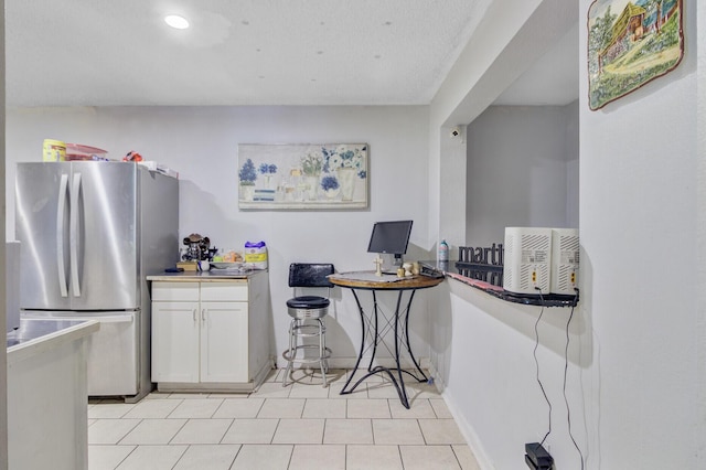 7074 W Constellation Dr, North Charleston, SC 29418 - kitchen featuring freestanding refrigerator, white cabinets, and recessed lighting