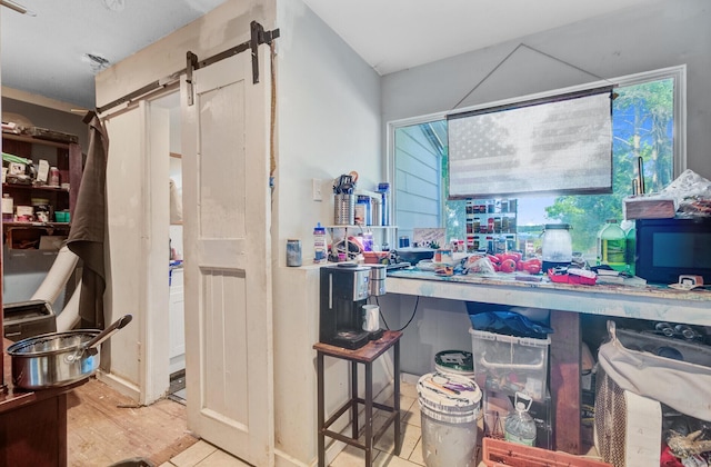 7074 W Constellation Dr, North Charleston, SC 29418 - bar area with a barn door and wood finished floors