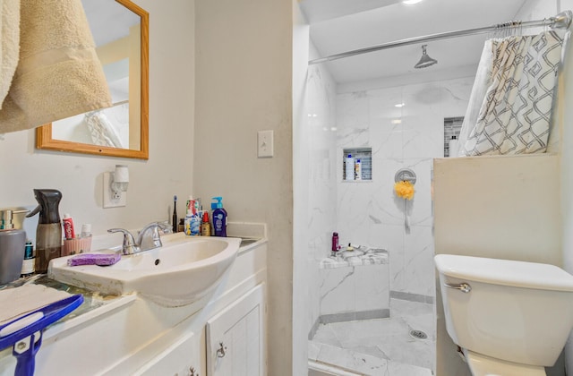 7074 W Constellation Dr, North Charleston, SC 29418 - bathroom featuring vanity and a marble finish shower