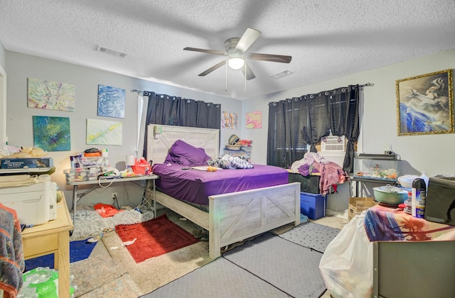 7074 W Constellation Dr, North Charleston, SC 29418 - bedroom featuring a textured ceiling and ceiling fan