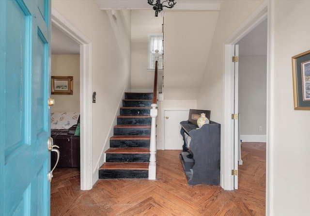 staircase with parquet floors