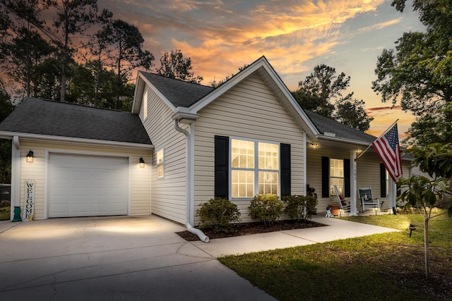 1583 Southwick Dr, Johns Island, SC 29455 - ranch-style home featuring driveway, covered porch, a garage, a front yard, and roof with shingles