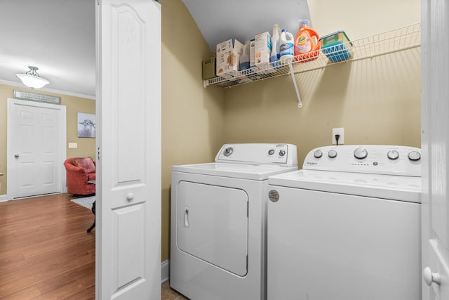1583 Southwick Dr, Johns Island, SC 29455 - washroom featuring washer and dryer, ornamental molding, and wood finished floors