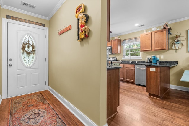 1583 Southwick Dr, Johns Island, SC 29455 - entrance foyer featuring ornamental molding, wood finished floors, and baseboards