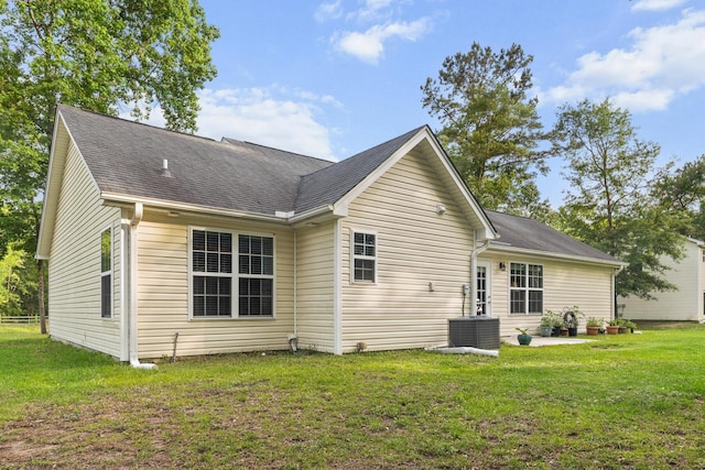 1583 Southwick Dr, Johns Island, SC 29455 - rear view of house featuring a yard and roof with shingles