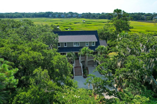 birds eye view of property with a rural view