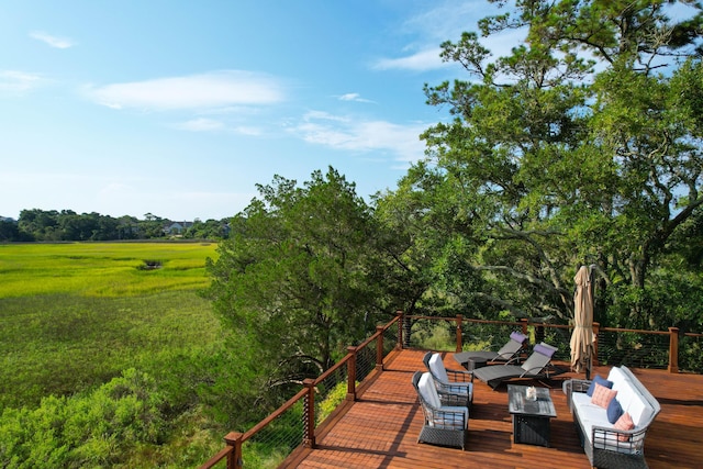 wooden deck featuring an outdoor hangout area