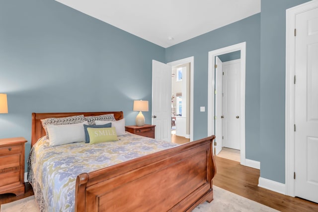 bedroom featuring light wood-type flooring