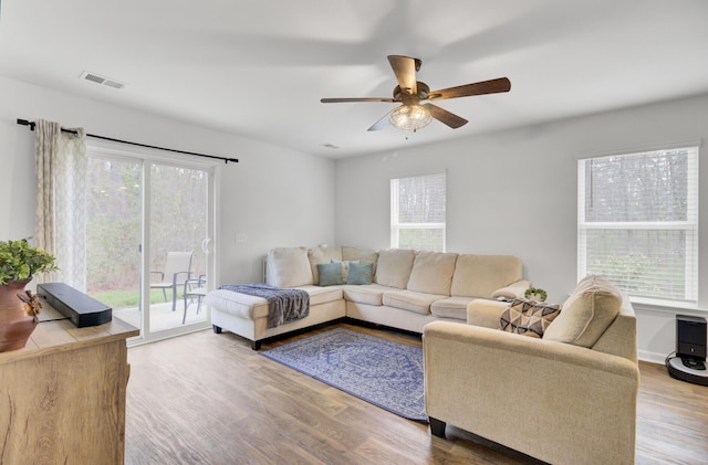 127 Rosefield Ct, Summerville, SC 29485 - living area featuring visible vents, wood finished floors, and ceiling fan
