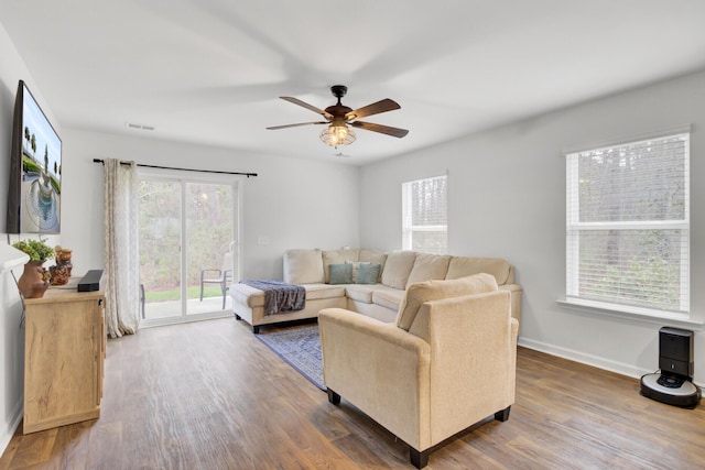 127 Rosefield Ct, Summerville, SC 29485 - living room with a ceiling fan, wood finished floors, visible vents, and baseboards