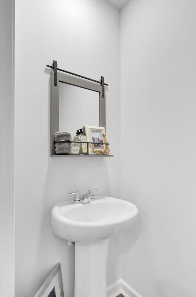 127 Rosefield Ct, Summerville, SC 29485 - bathroom with baseboards and a sink