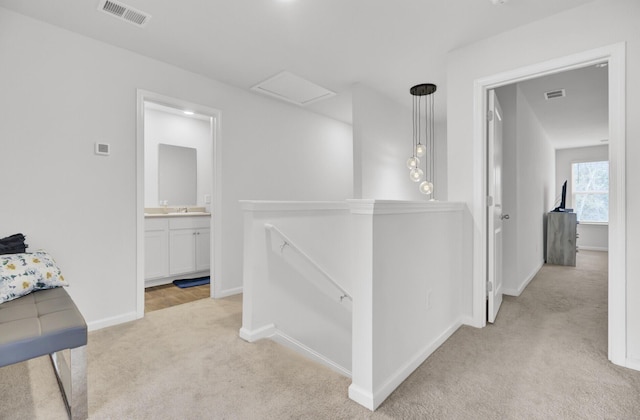 127 Rosefield Ct, Summerville, SC 29485 - hallway featuring light colored carpet, an upstairs landing, and visible vents