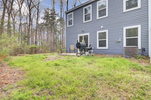 127 Rosefield Ct, Summerville, SC 29485 - rear view of house featuring a patio area, heating fuel, central AC unit, and a lawn