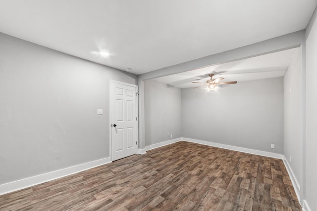 spare room with hardwood / wood-style flooring and ceiling fan