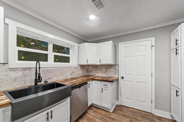 kitchen featuring butcher block counters, dishwasher, white cabinets, and dark wood-type flooring