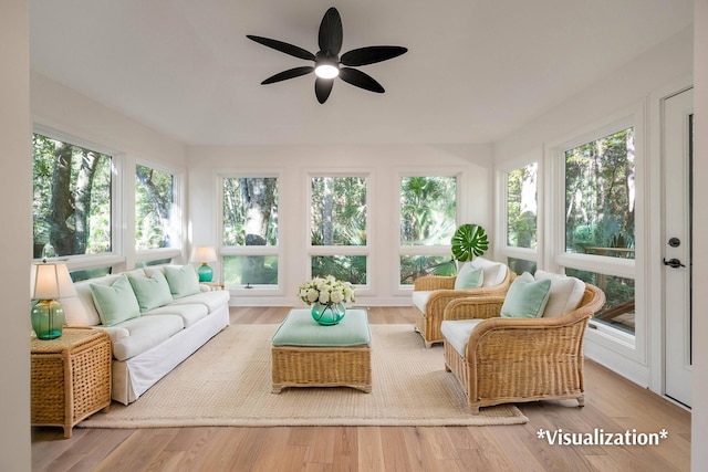 sunroom featuring ceiling fan