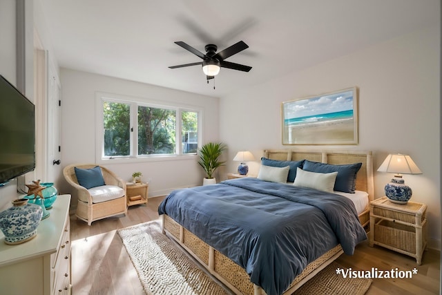 bedroom featuring wood-type flooring and ceiling fan