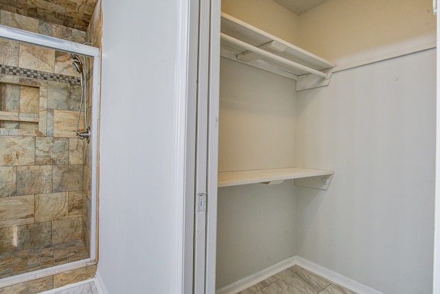 interior space featuring walk in shower