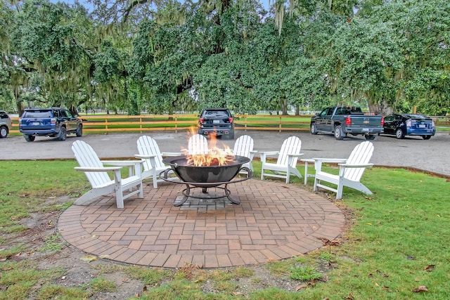 view of patio / terrace featuring a fire pit