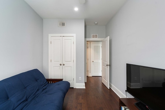 sitting room featuring wood finished floors and baseboards