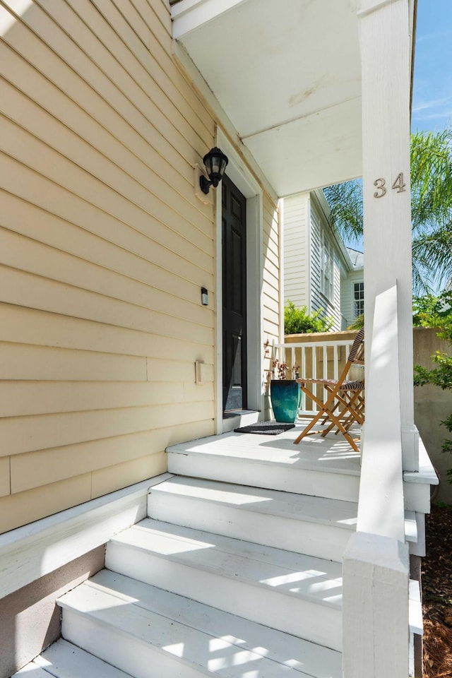 entrance to property with covered porch