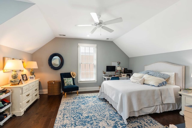 bedroom with lofted ceiling, wood finished floors, ceiling fan, and baseboards