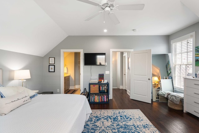bedroom with wood finished floors, vaulted ceiling, a ceiling fan, and baseboards