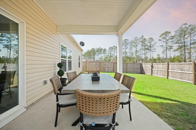 view of patio / terrace with a fenced backyard and outdoor dining space