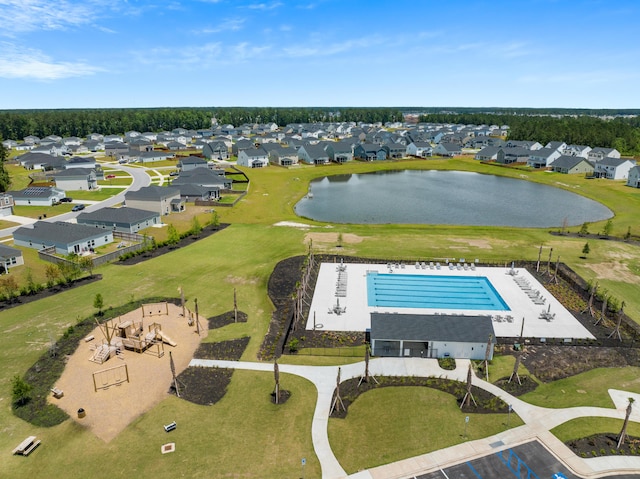 aerial view featuring a residential view and a water view