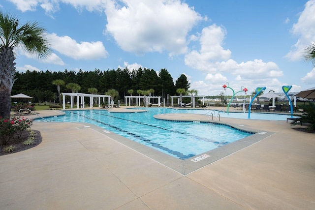 community pool featuring a patio and a pergola