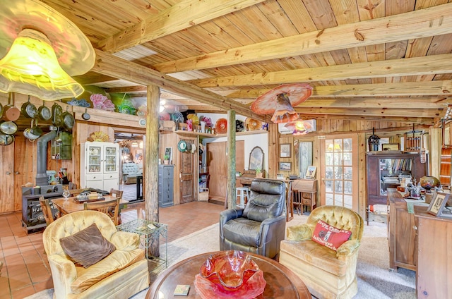 1373 Bridge St, Branchville, SC 29432 - living area with a wood stove, french doors, wood ceiling with exposed beams, and wood walls