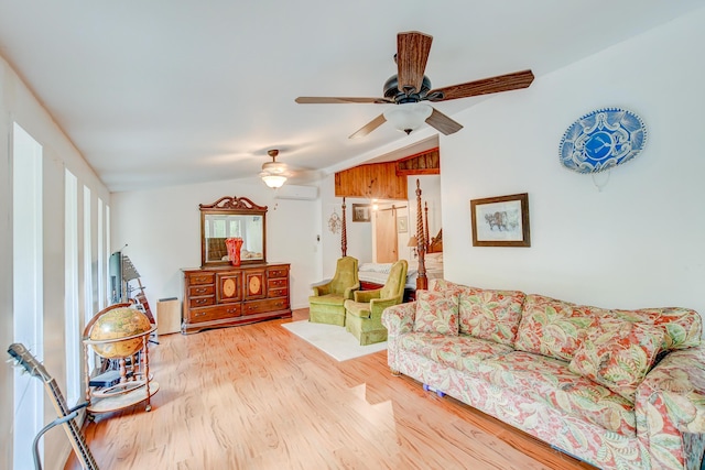 1373 Bridge St, Branchville, SC 29432 - living area with vaulted ceiling, ceiling fan, wood finished floors, and a wall mounted AC