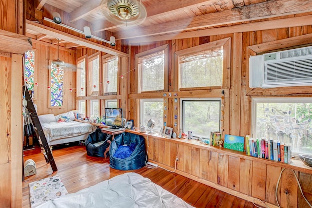 1373 Bridge St, Branchville, SC 29432 - bedroom with wooden walls, hardwood / wood-style floors, and wooden ceiling with exposed beams
