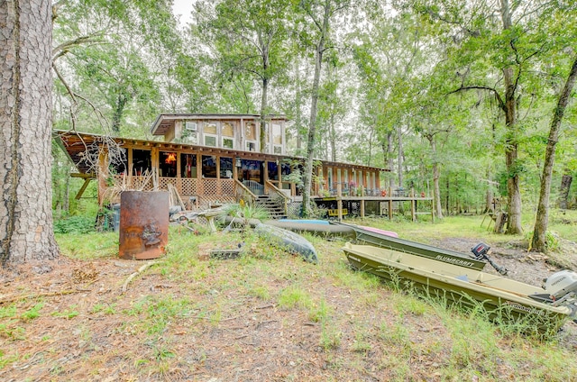 1373 Bridge St, Branchville, SC 29432 - rear view of house featuring a wooden deck, a sunroom, and stairway