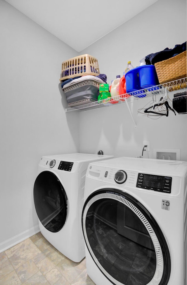 washroom featuring separate washer and dryer