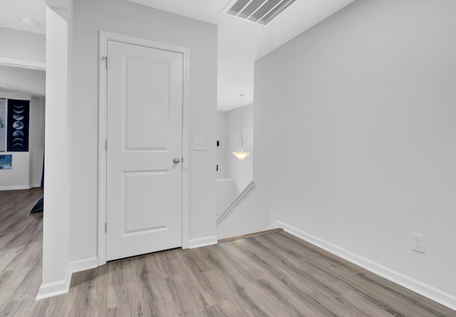 corridor featuring light hardwood / wood-style flooring