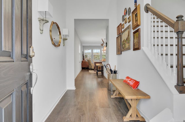 corridor featuring hardwood / wood-style flooring