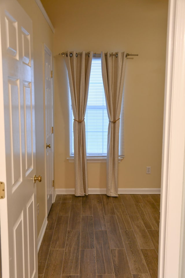 spare room with dark hardwood / wood-style flooring