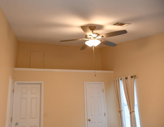 unfurnished room featuring ceiling fan