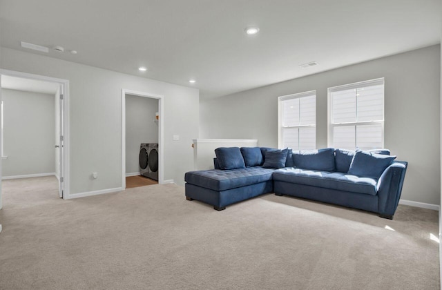 living area with baseboards, visible vents, carpet floors, separate washer and dryer, and recessed lighting