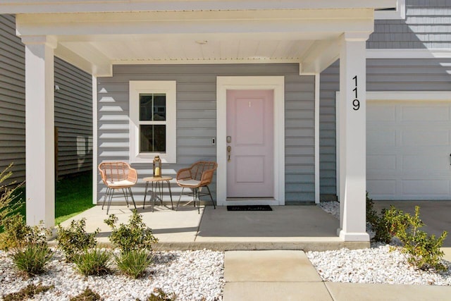 doorway to property featuring a porch