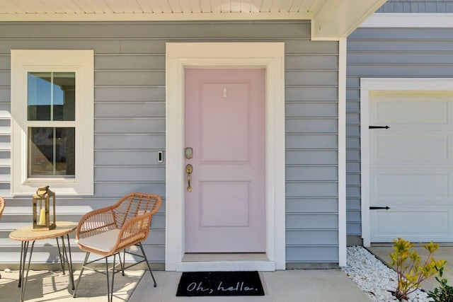 entrance to property featuring a garage