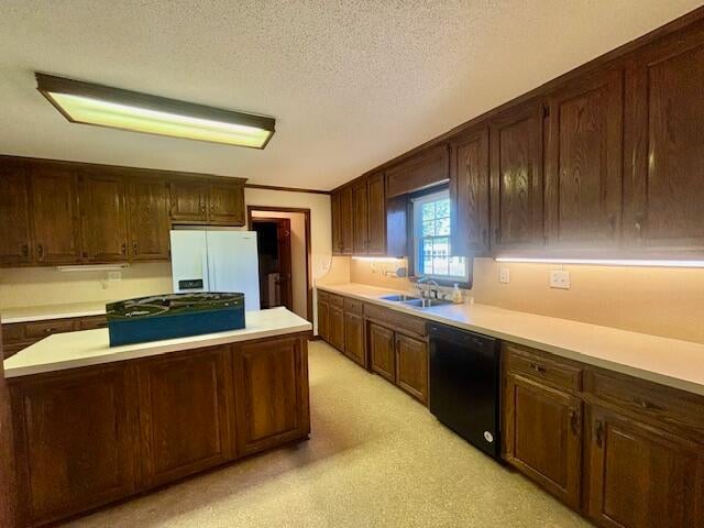 kitchen featuring black dishwasher, sink, a textured ceiling, white refrigerator with ice dispenser, and ornamental molding