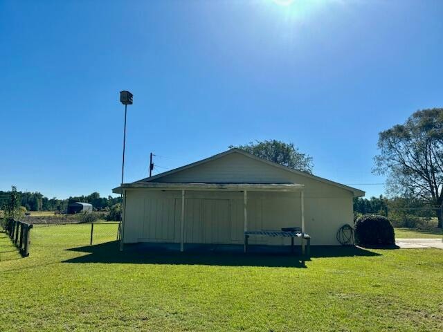 view of home's exterior featuring a lawn