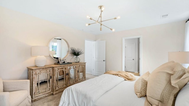 bedroom featuring an inviting chandelier, visible vents, and light colored carpet