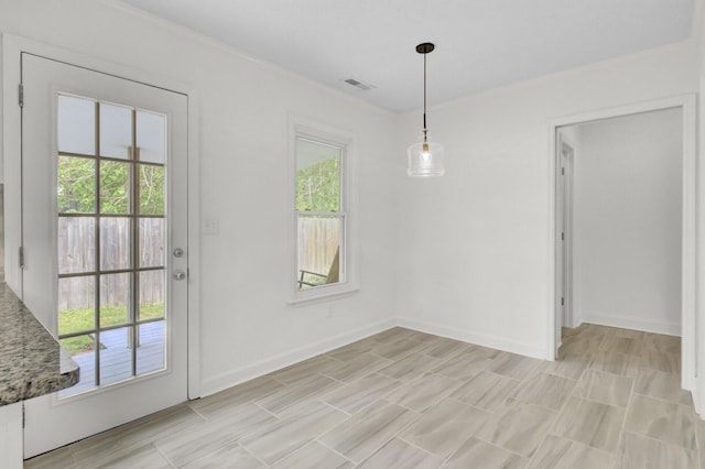 509 Hill St, Moncks Corner, SC 29461 - unfurnished dining area featuring healthy amount of natural light and baseboards