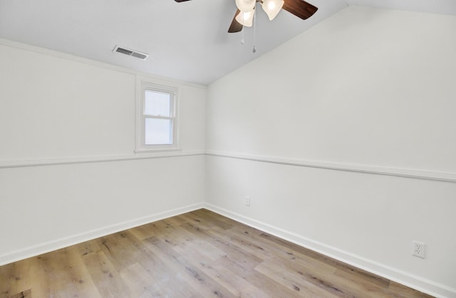 509 Hill St, Moncks Corner, SC 29461 - spare room with ceiling fan, lofted ceiling, wood finished floors, and baseboards