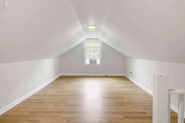 509 Hill St, Moncks Corner, SC 29461 - bonus room with light wood finished floors, vaulted ceiling, and baseboards