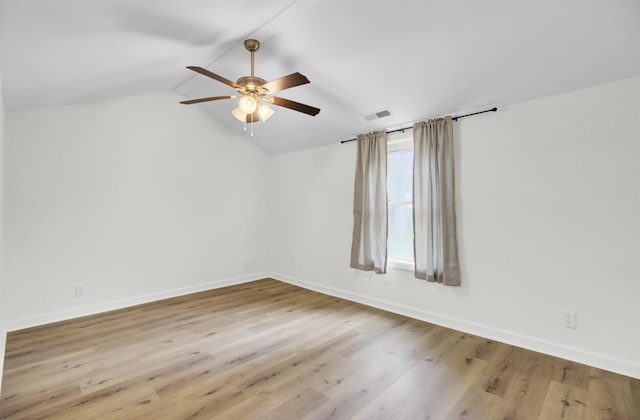 509 Hill St, Moncks Corner, SC 29461 - empty room featuring ceiling fan, wood finished floors, lofted ceiling, and baseboards
