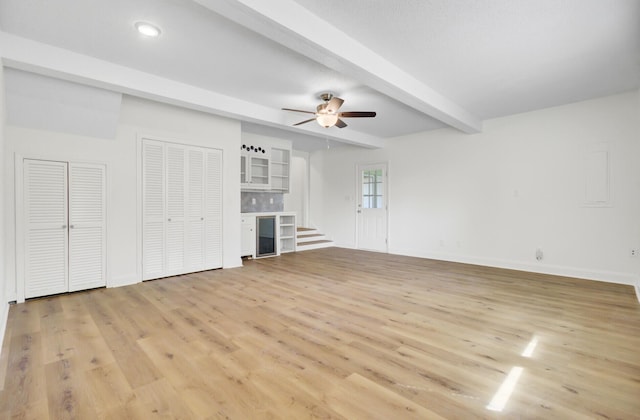 509 Hill St, Moncks Corner, SC 29461 - unfurnished living room featuring light wood-style floors, beam ceiling, a ceiling fan, baseboards, and recessed lighting